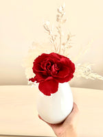 Load image into Gallery viewer, Small preserved red rose in a white slim vase
